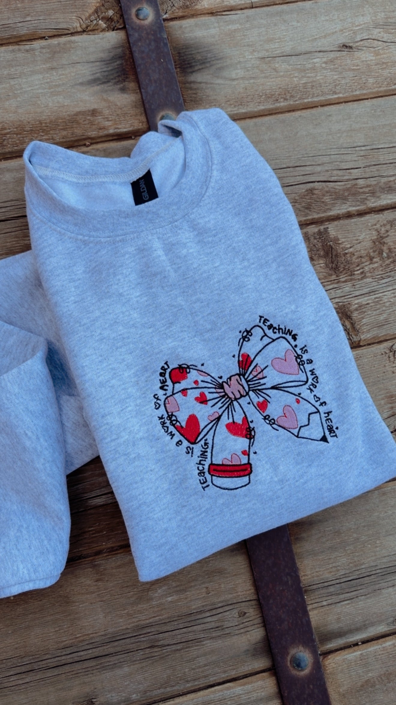 EMBROIDERED "teaching is a work of heart" crew