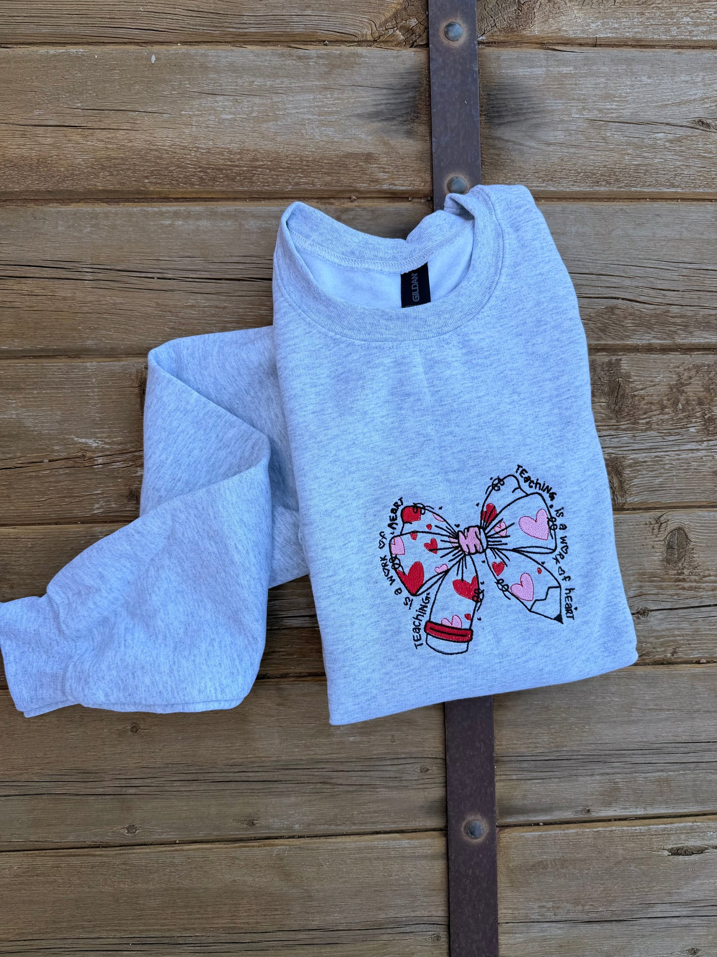 EMBROIDERED "teaching is a work of heart" crew