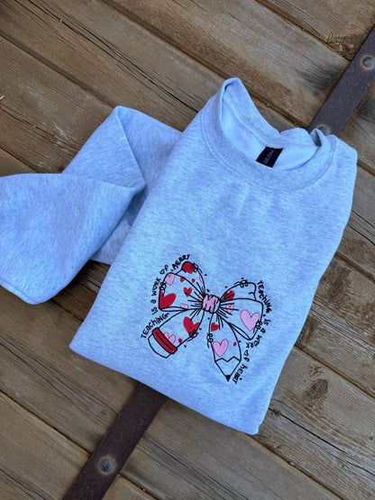 EMBROIDERED "teaching is a work of heart" crew