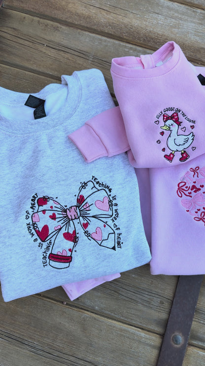 EMBROIDERED "teaching is a work of heart" crew